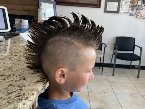 JD Barber Shop Magnolia TX Photo Gallery Vibrant mohawk hairstyle on young boy at JD Barber Shop in Texas.
