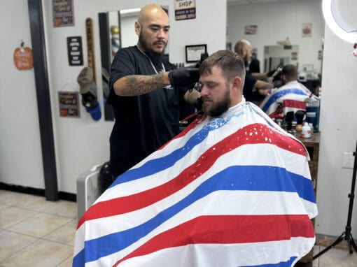 JD Barber Shop Magnolia TX Photo Gallery Barber cutting men's hair at JD Barber Shop, professional grooming and haircuts.