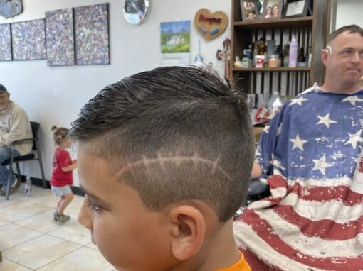 JD Barber Shop Magnolia TX Photo Gallery Stylish boys haircut with fade and design at JD Barber Shop for kids.
