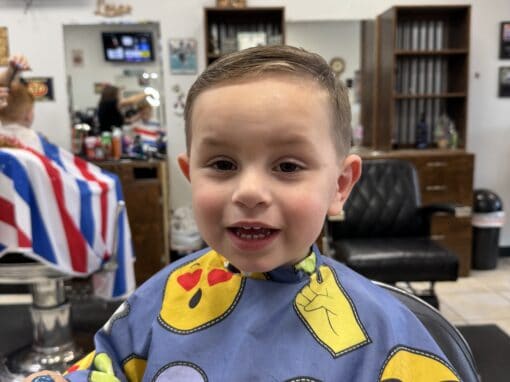 JD Barber Shop Traditional Barber Shop Services in Magnolia, Texas Happy young boy with a fresh haircut at JD Barber Shop.